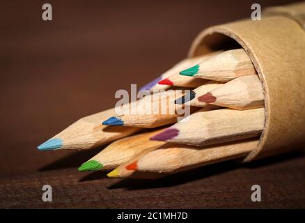 Colored pencils and pencils in rank and file Stock Photo