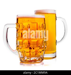 Two Mugs of fresh beer with cap foam Stock Photo
