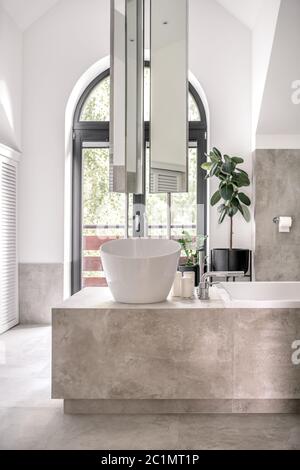 Stylish bathroom in modern style with different walls Stock Photo