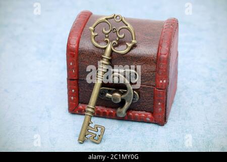 vintage key and old treasure chest on table Stock Photo