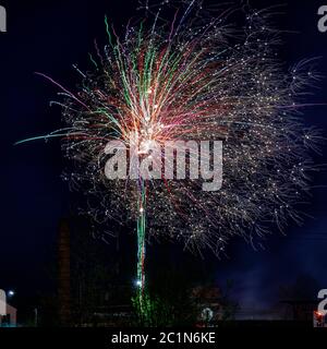 Colorful fireworks on the background of the night black sky Stock Photo