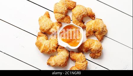 Croissants lying around jam Stock Photo