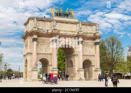 Paris, France, March 28 2017: The Arc de Triomphe du Carrousel is a triumphal arch in Paris, located in the Place du Carrousel Stock Photo