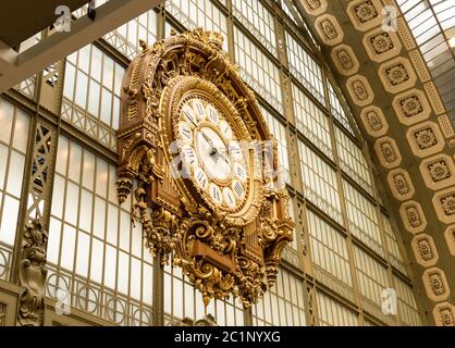 Paris, France, March 31 2017: Golden clock of the museum D'Orsay.The Musee d'Orsay is a museum in Paris, on the left bank of the Stock Photo