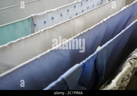 Laundry drying on a clotheshorse Stock Photo