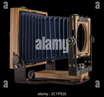 Intrepid 4X5 Mark IV Plywood Folding Field Film Camera on Plain Black Background for Easy Isolation and Cutout Stock Photo