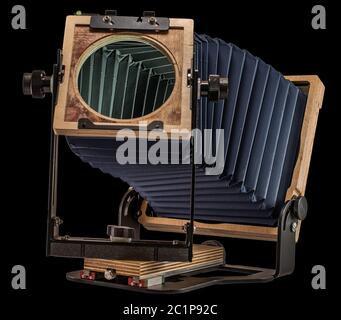 Intrepid 4X5 Mark IV Plywood Folding Field Film Camera on Plain Black Background for Easy Isolation and Cutout Stock Photo