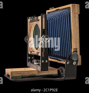 Intrepid 4X5 Mark IV Plywood Folding Field Film Camera on Plain Black Background for Easy Isolation and Cutout Stock Photo