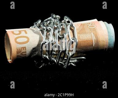 Money in chains Stock Photo