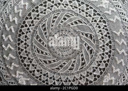 Handmade lace on black background Stock Photo