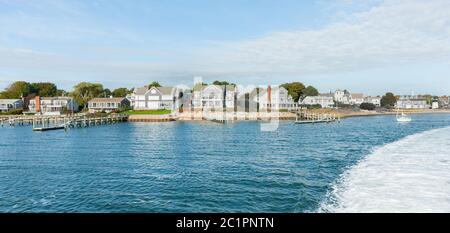 Charactistic style Cape Cod architecture along waters edge on Martha's Vineyard, Usa. Stock Photo