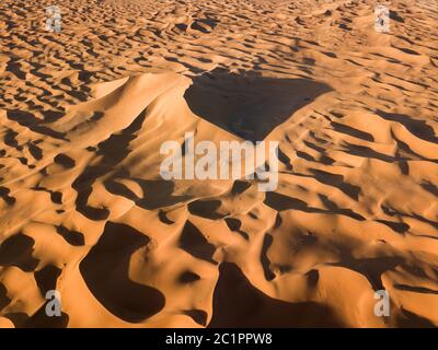 Aerial view on big sand dunes in desert