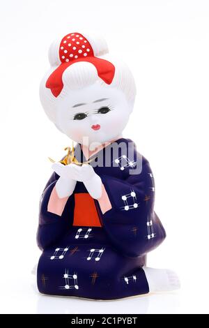 Traditional Japanese Hakata girl doll isolated on white background Stock Photo