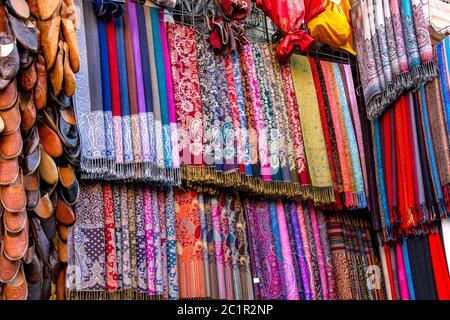 Fabric a d shoe shop in a souk somewhere in Egypt Stock Photo