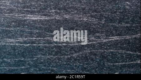 Texture and Seamless background of black granite stone. Stock Photo