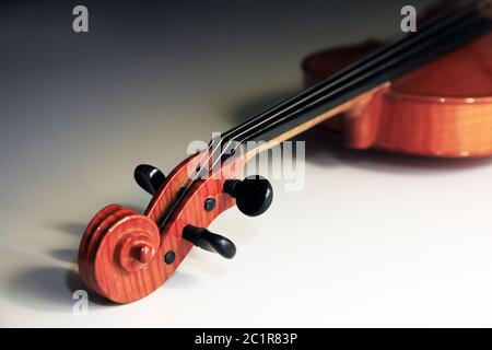 1937 old violin on the dim background Stock Photo