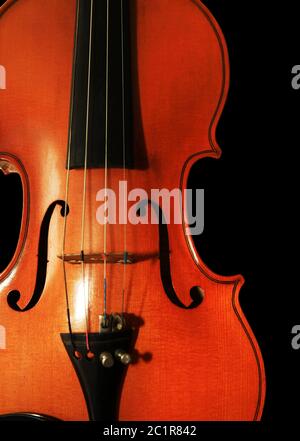 1937 old violin on the black background Stock Photo