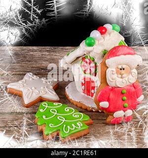 Gingerbread house on wooden background Stock Photo