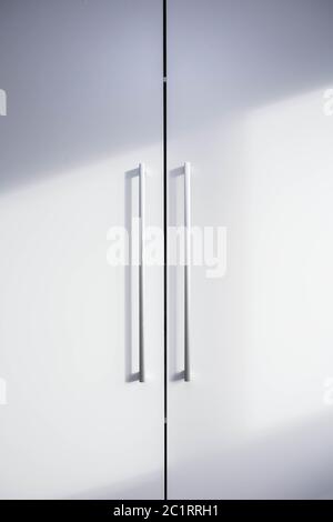 White closet doors wood closeup with shadows Stock Photo