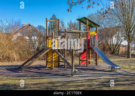 Jungle gym on a deserted playground in late autumn Stock Photo