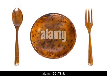 Wooden bowl with spoon and fork on white background Stock Photo