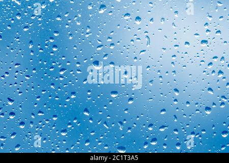 Water drops on blue background Stock Photo