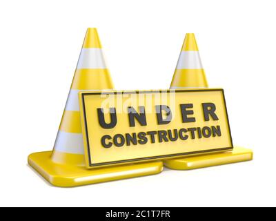 Yellow UNDER CONSTRUCTION sign and two road cones Stock Photo