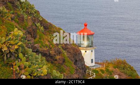 lighthouse on the hawaiian island of oahu at sunset Stock Photo