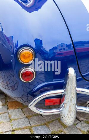 Rear view of an American sports car of the sixties Stock Photo