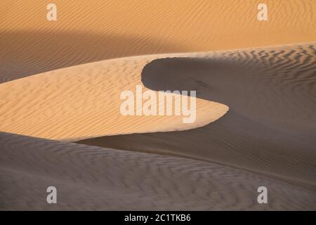 Background with sandy dunes in desert Stock Photo