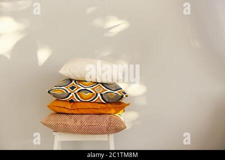 Colorful pillows on the chair Stock Photo