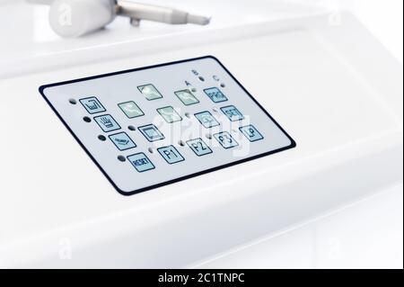 Close-up of the control panel with buttons on the dental chair Stock Photo