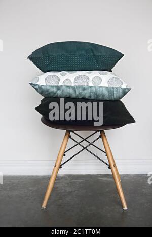 Green pillows on the chair Stock Photo