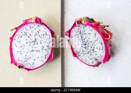 Sliced dragon fruit on the light background. Close up Stock Photo
