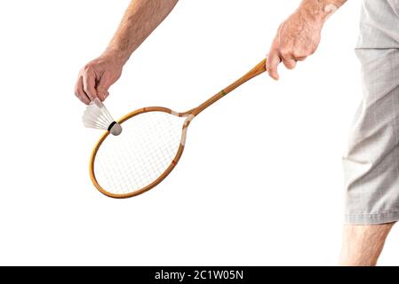 Vintage wooden badminton racket in hand isolated on white background Stock Photo