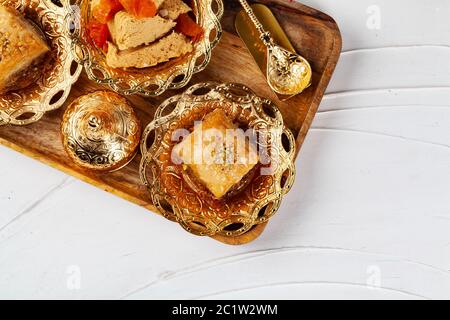 Turkish sweet desserts, halva with dried apricots Stock Photo