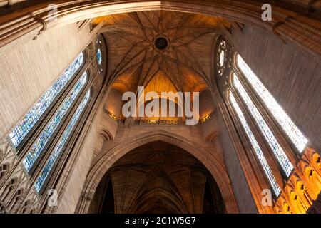 The interior of Liverpool Cathedral, looking up into the vault below the central belltower: Liverpool, England, UK. Liverpool Cathedral is the largest Stock Photo