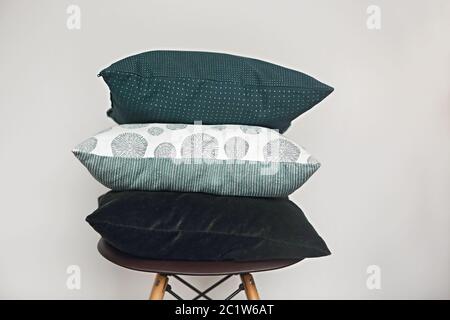 Green pillows on the chair Stock Photo