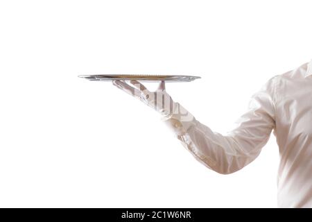 Waiter holding empty silver tray isolated on white background Stock Photo