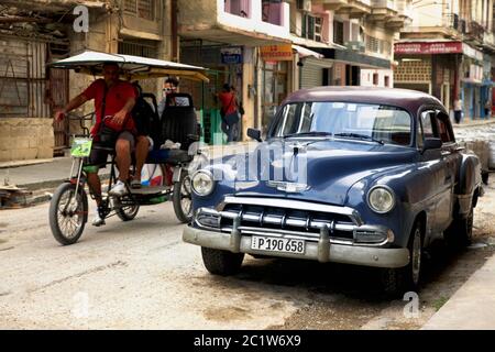 Vintage cars on the streets of colorful Havana Stock Photo
