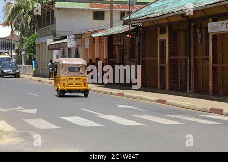 Traffic scene, tuk-tuk taxis on street, Andoany/Hell-Ville City, Madagascar. Stock Photo