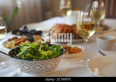 People fine dining seafood and white wine Stock Photo