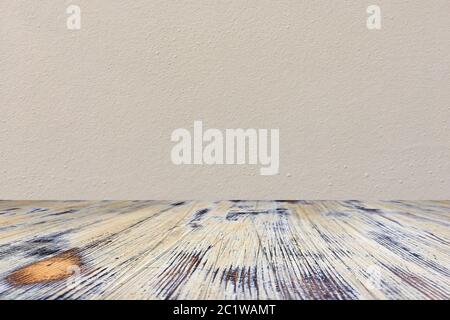 washed wood table with concrete texture background. Stock Photo