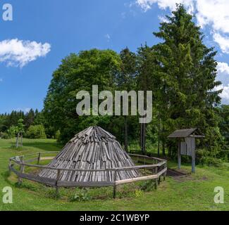 Charcoal pile for presentation on a meadow, taken on the Raichberg in the Swabian Alb, Germany Stock Photo