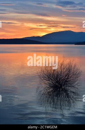 Incredibly Beautiful Sunset.Blue Sky with Amazing Colorful Clouds.Nature Background.Water.Lake. Stock Photo