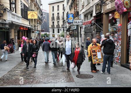MADRID, SPAIN - OCTOBER 21, 2012: People shop downtown in Madrid. Madrid is a popular tourism destinations with 3.9 million estimated annual visitors Stock Photo