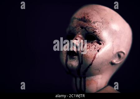 Creepy bloody doll in the dark Stock Photo