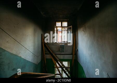 Burnt old rural house interior. Consequences of fire. Stock Photo