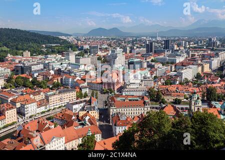 Ljubljana, Slovenia.  Overall view of the city.  The  pink coloured church is the Baroque style Franciscan Church of the Annunciation. Stock Photo