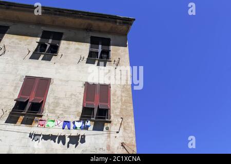 Old building with clothesline Stock Photo